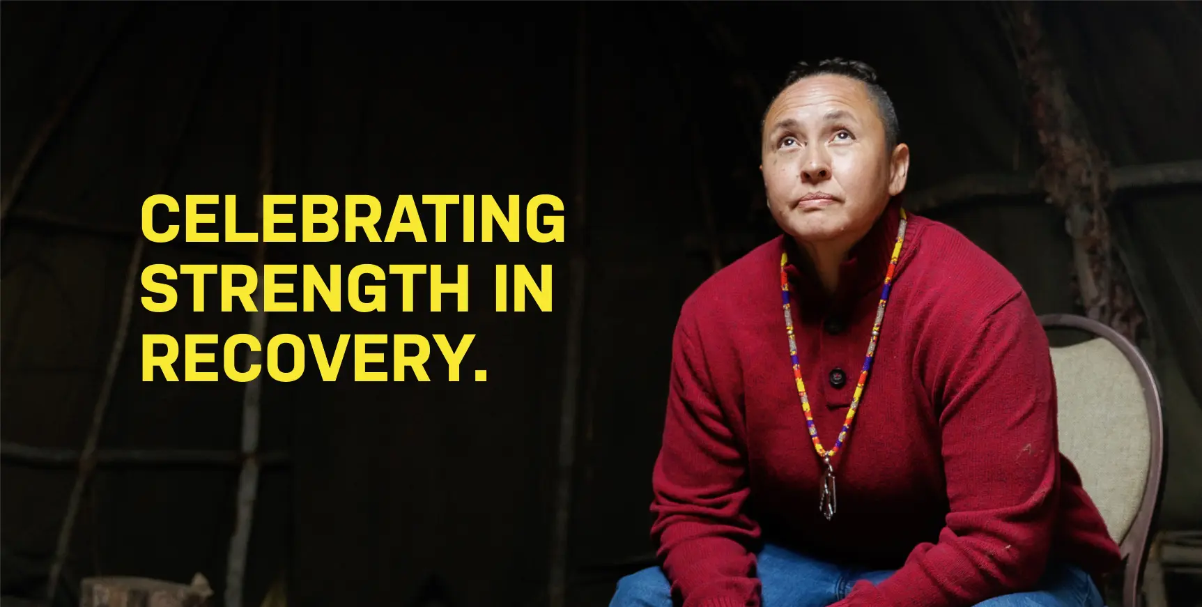 Lacey seated with a title of Celebrating Strength in Recovery